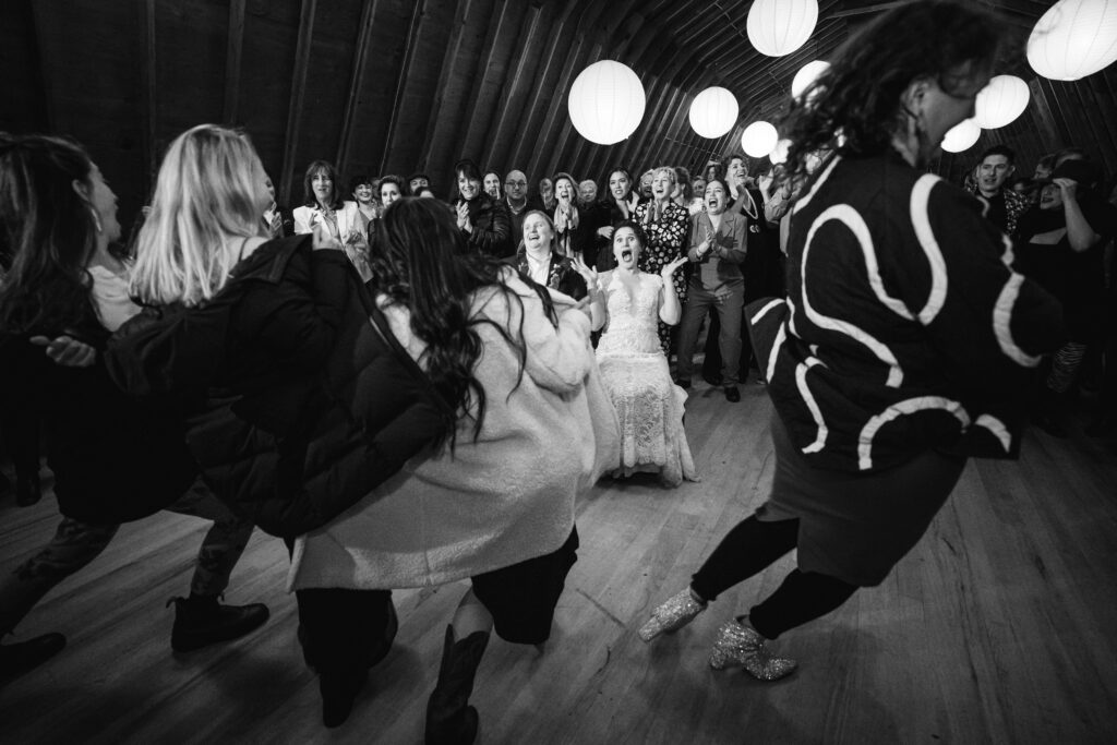 a jewish wedding dance in a barn